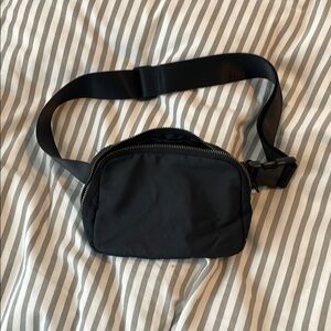 Amazon Black Mini Bag with Adjustable Strap and Durable Fabric